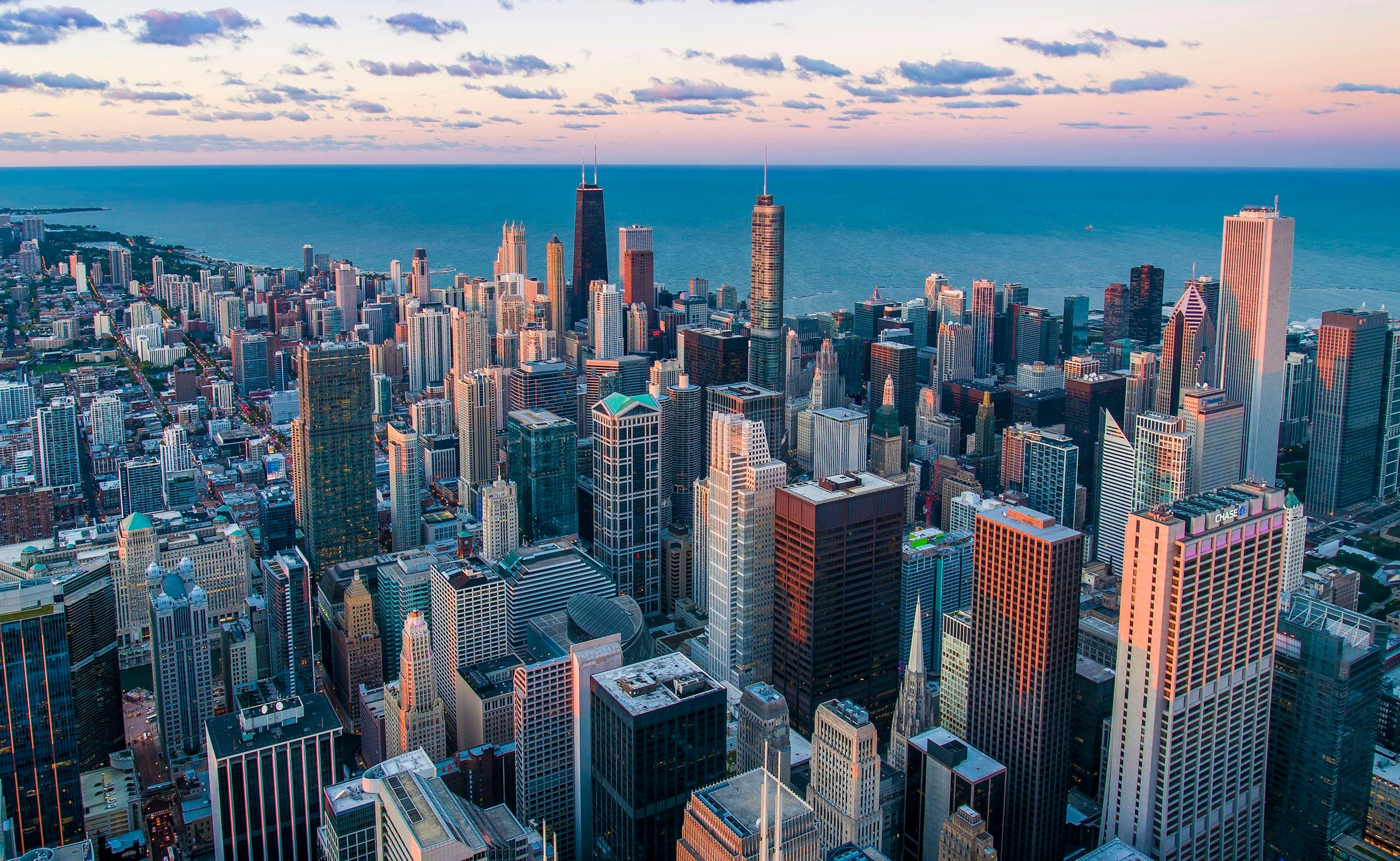 Aerial view of a North American city skyline at dusk